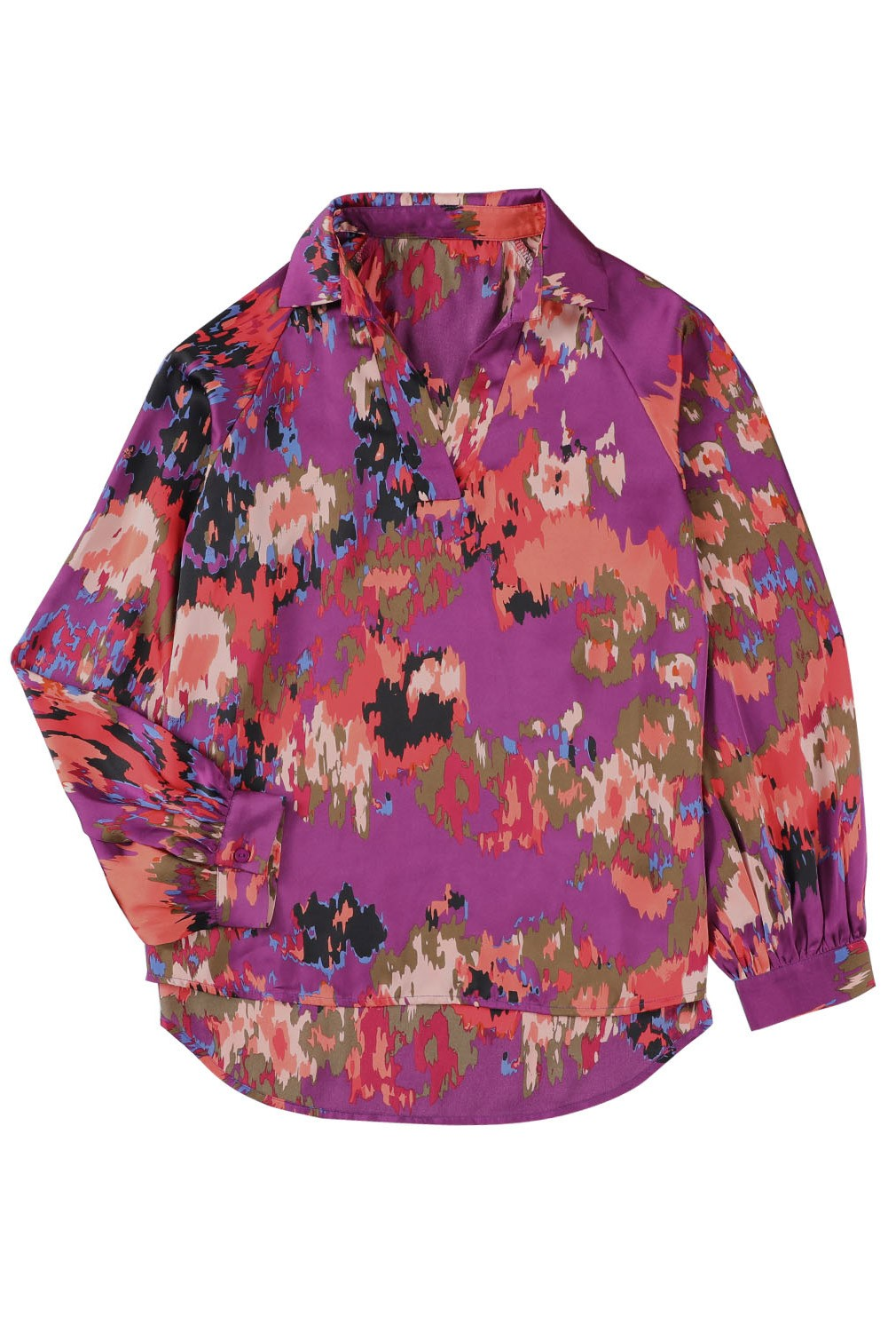 We love the colors in this watercolor print blouse. This flattering top features a collared v-neck, flowy cut, and oversized sleeves that button at the wrist. Looks perfect with a front tuck in jeans. 