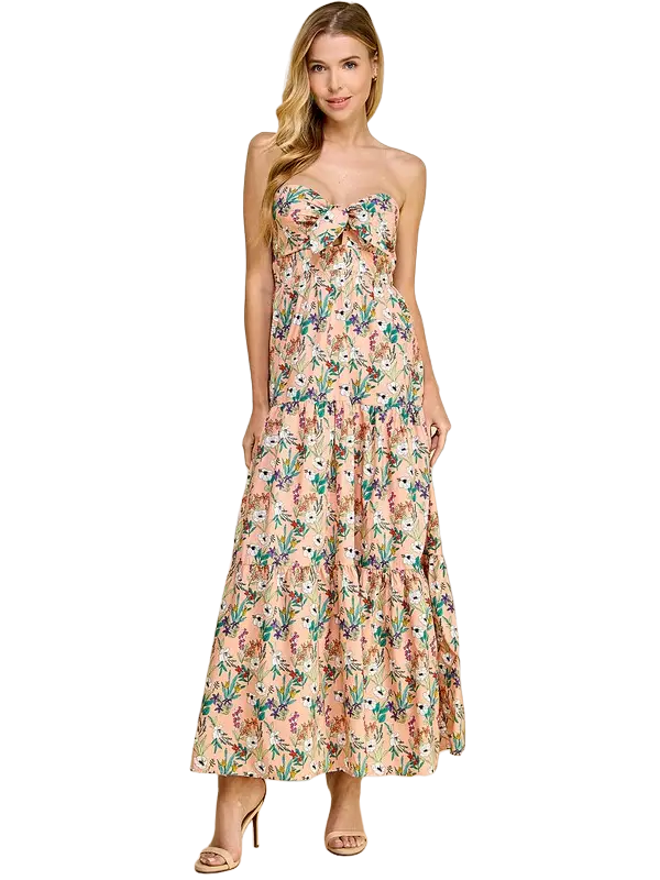 A floral print midi dress, with adjustable spaghetti straps. Featuring a smocked back, and a concealed back zipper.