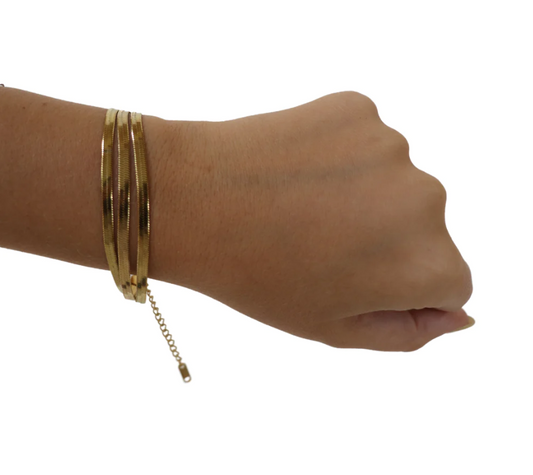 Wear this triple herringbone chain bracelet alone or alongside other chic pieces for a perfect ensemble.