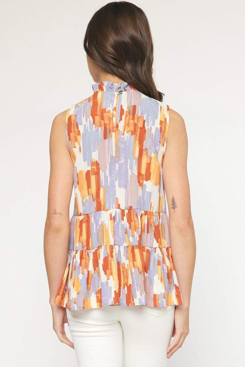 Print high-neck sleeveless tiered top featuring keyhole button closure at back neck. Unlined. Woven. Non-sheer. Lightweight.