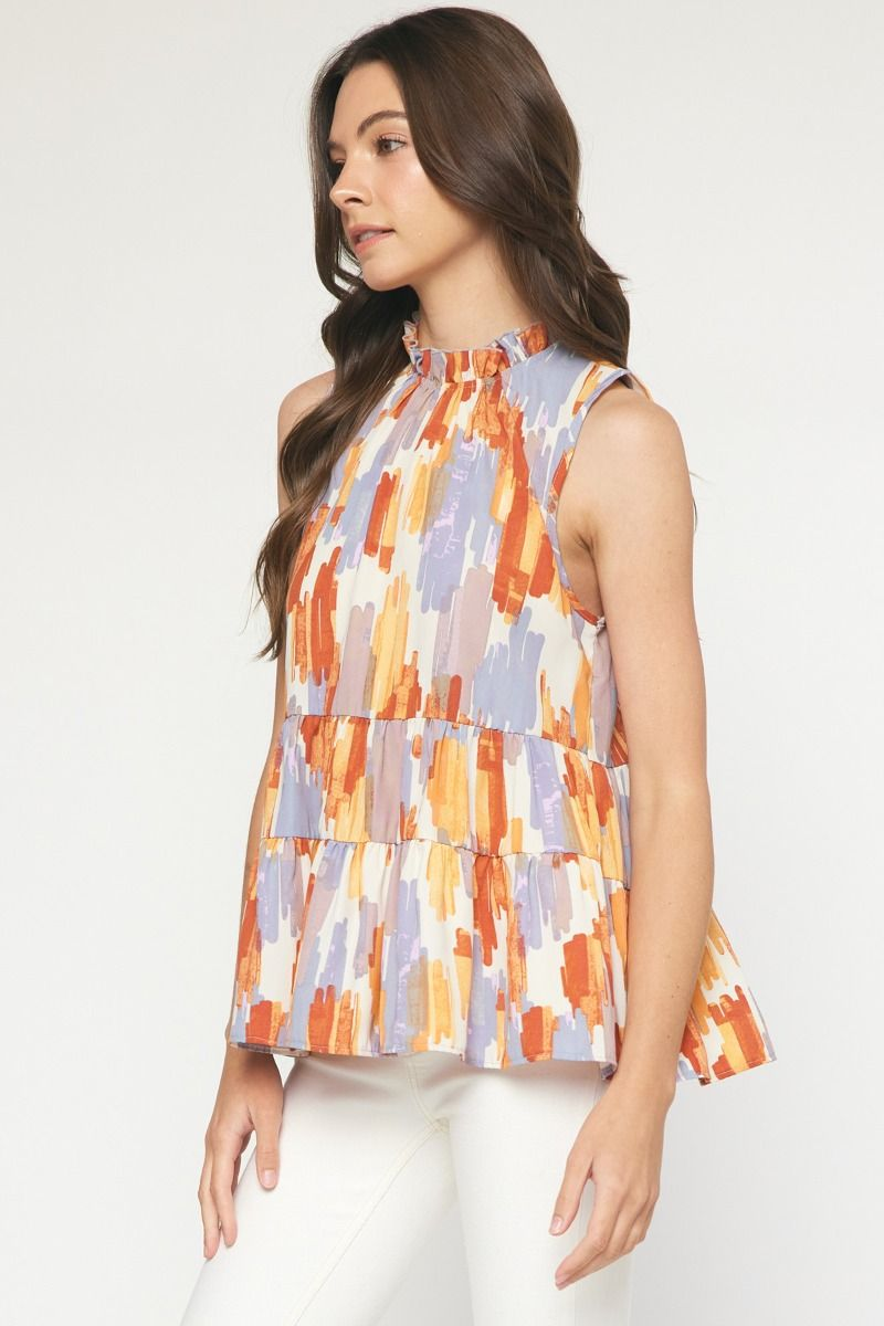 Print high-neck sleeveless tiered top featuring keyhole button closure at back neck. Unlined. Woven. Non-sheer. Lightweight.